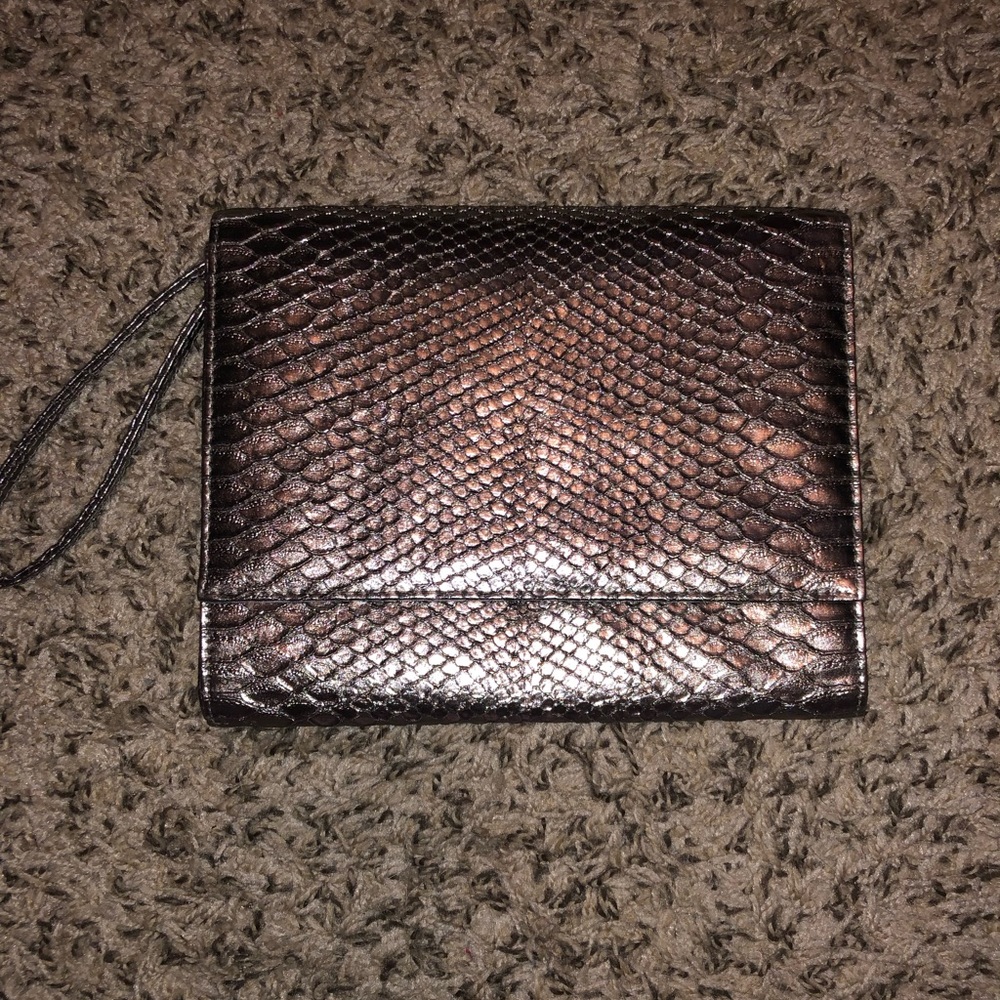 Neiman Marcus brand silver clutch